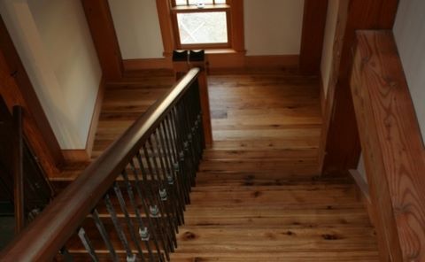 hardwood stairway with railing